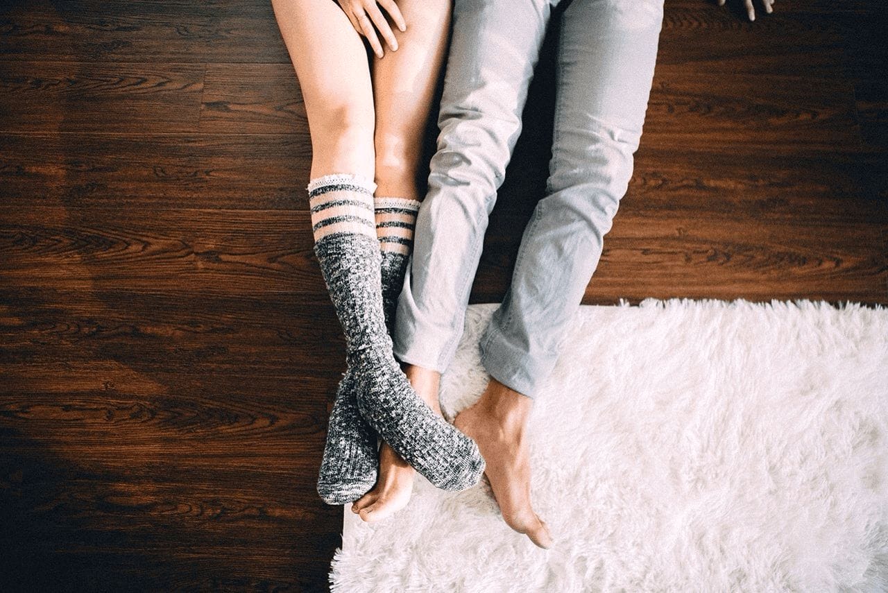 couple with legs entertwined