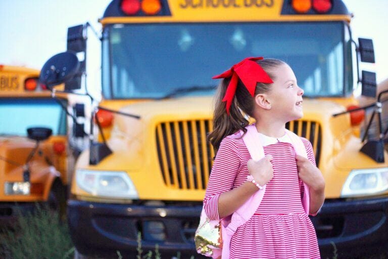 kindergartener waiting for bus