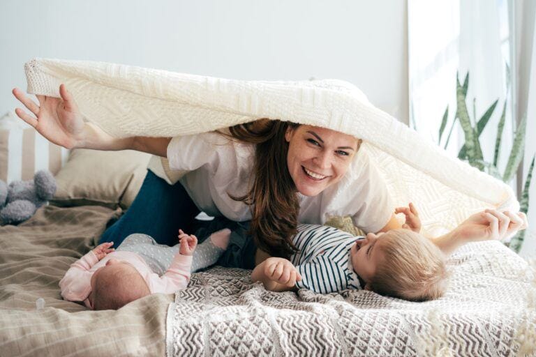 mom playing with kids