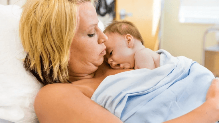 mom doing skin-to-skin with new baby