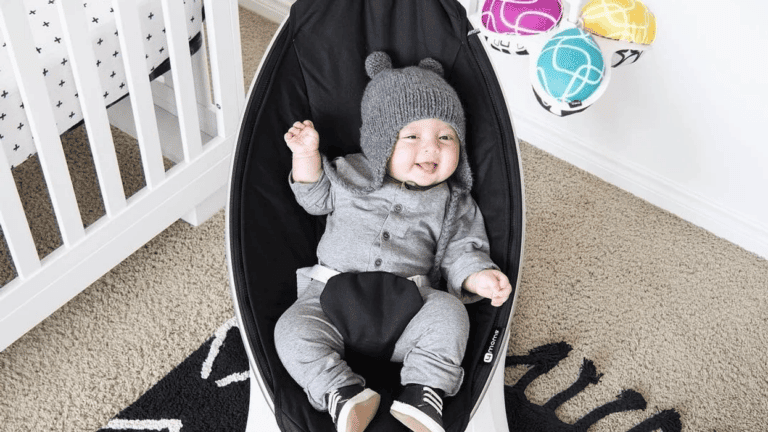 baby in a baby swing