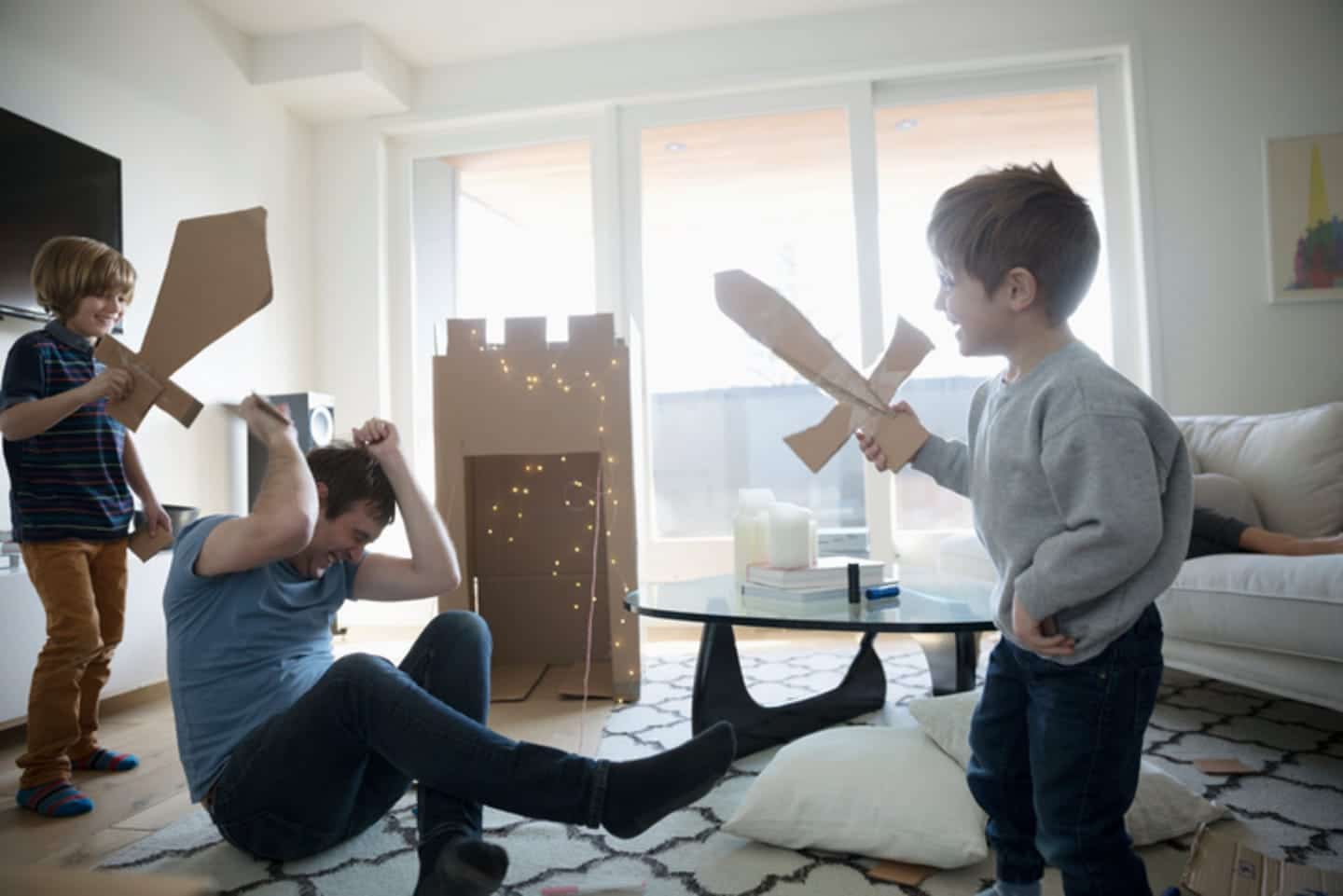 Father playing with his kids