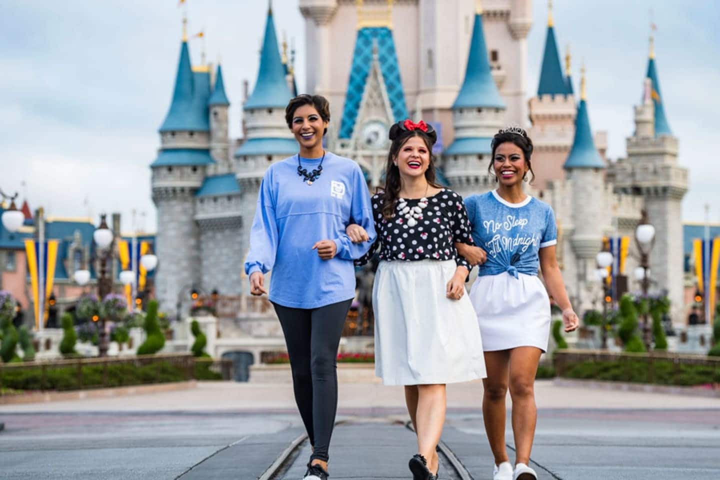 3 women walking in Disney World