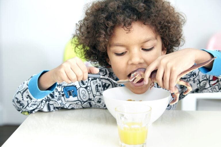 child eating cereal