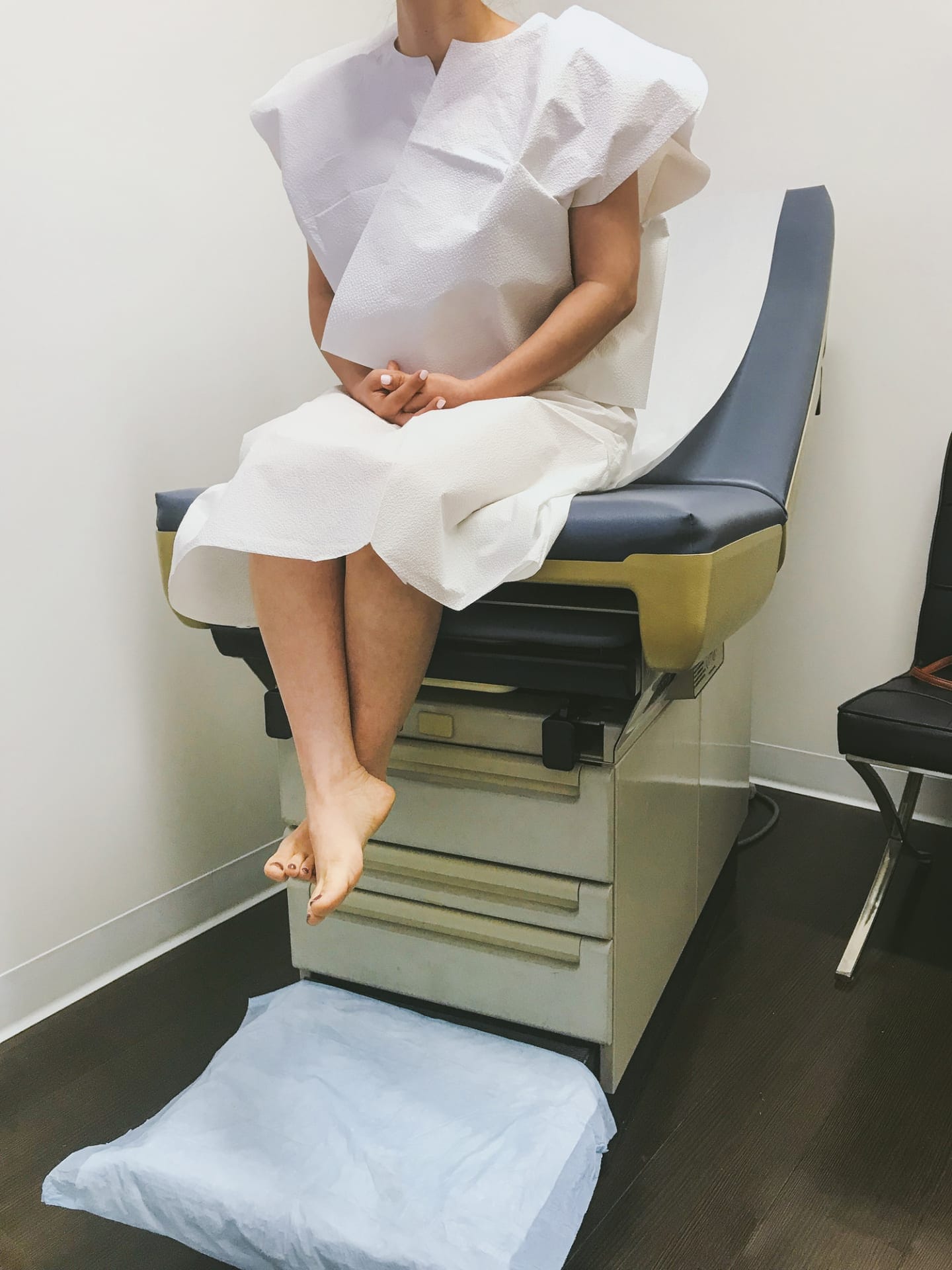 woman sitting in an examination chair