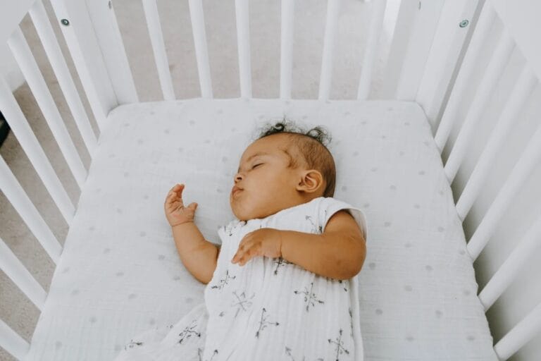 baby sleeping in a crib