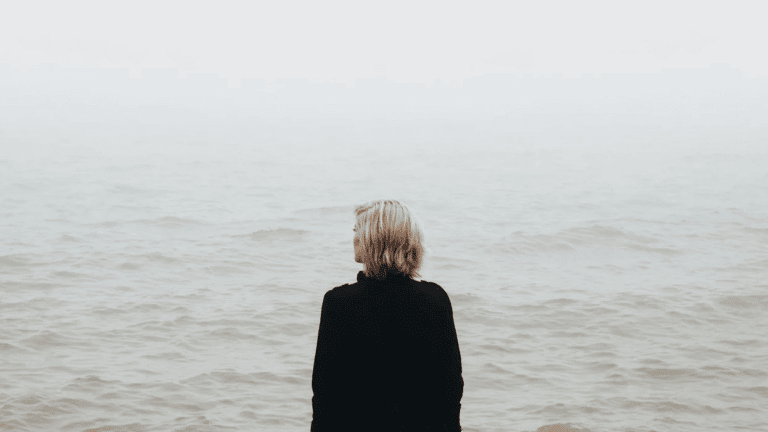 woman overlooking a body of water