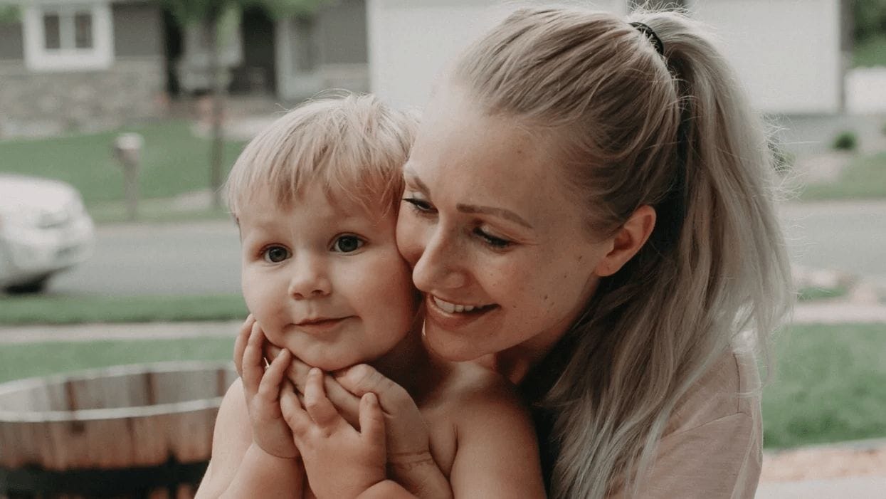 mom hugging son