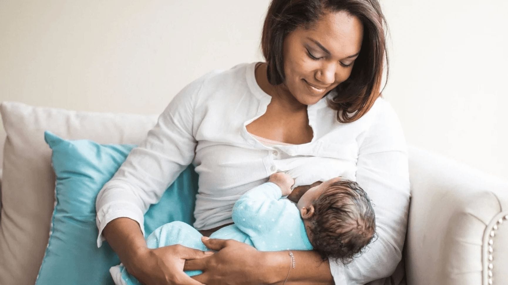 mom breastfeeding baby