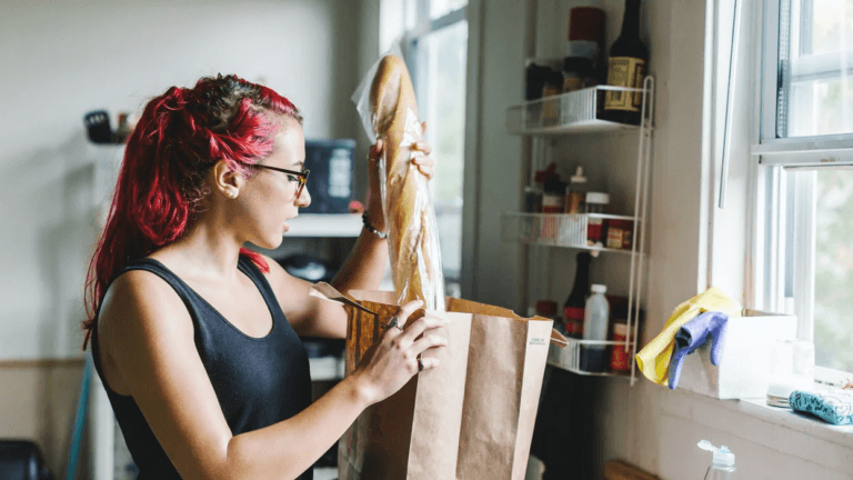 woman putting away groceries