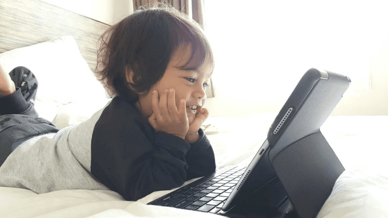 toddler watching a tablet