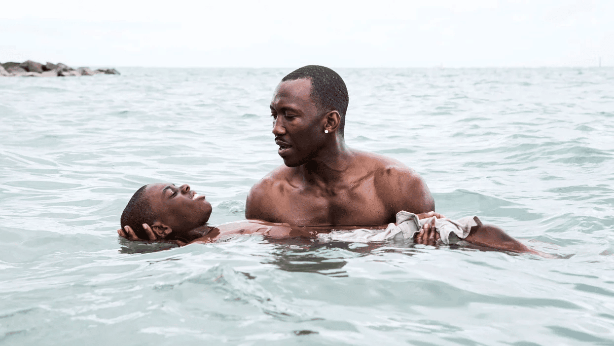 one man holding another man in a body of water- lgbtq teen movies