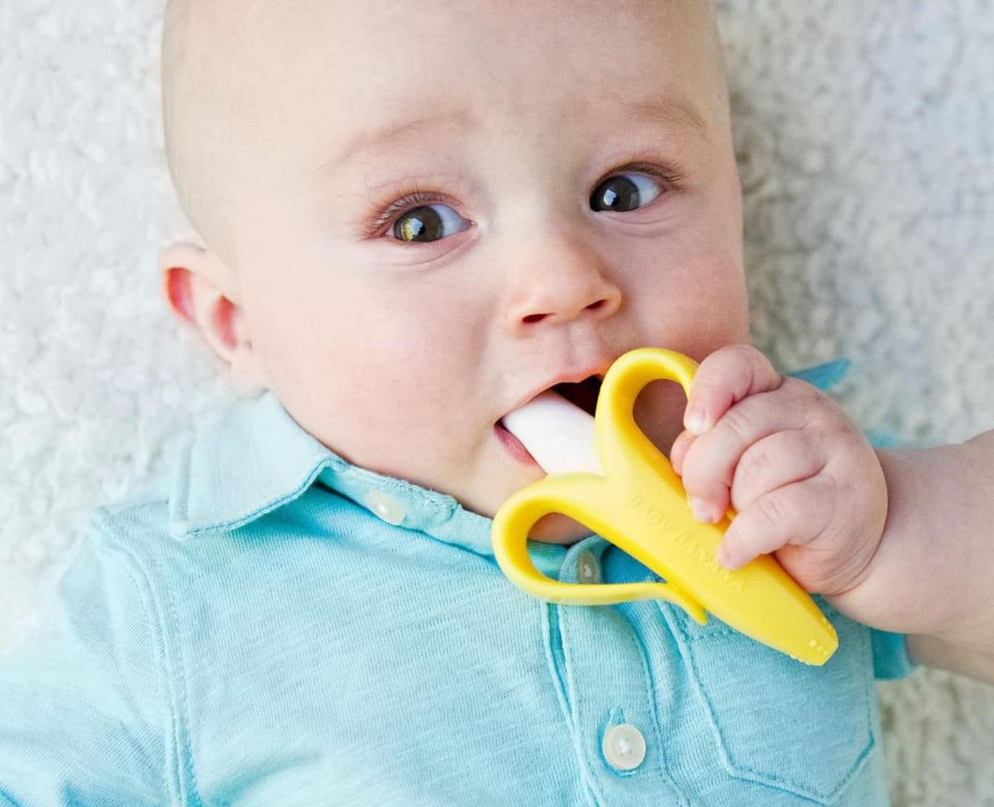 baby chewing banana teether, one of the best teething toys for babies