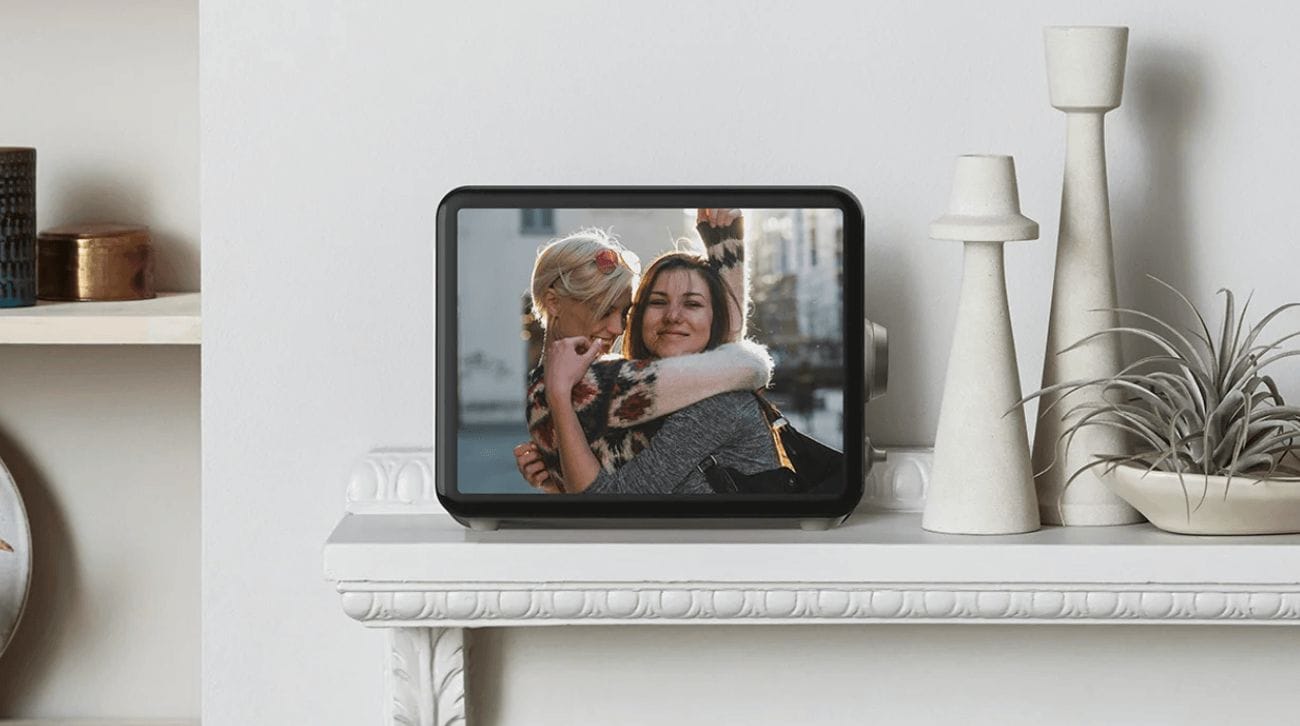 Loop digital frame sitting on a mantle