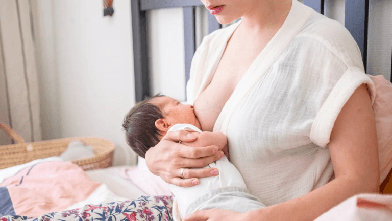 mom breastfeeding baby