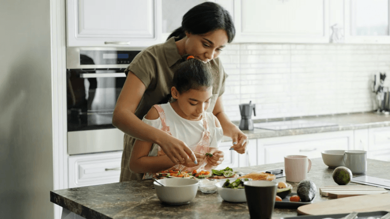 woman cooking with daughter