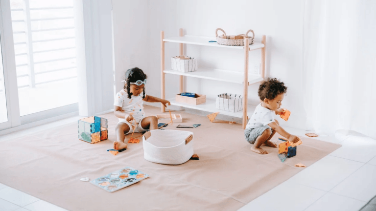 kids playing on a mat on the floor