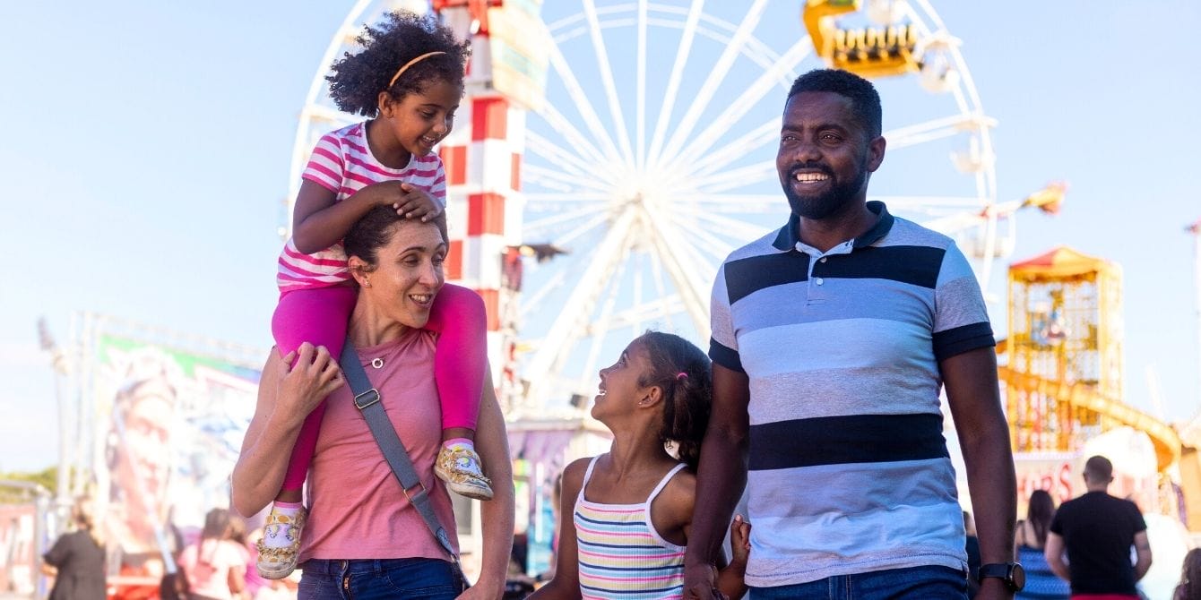 Family having fun at amusement park