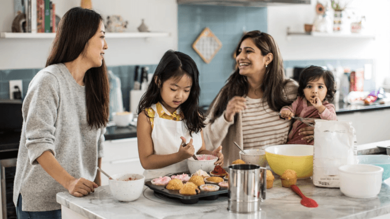 mom baking with daughters