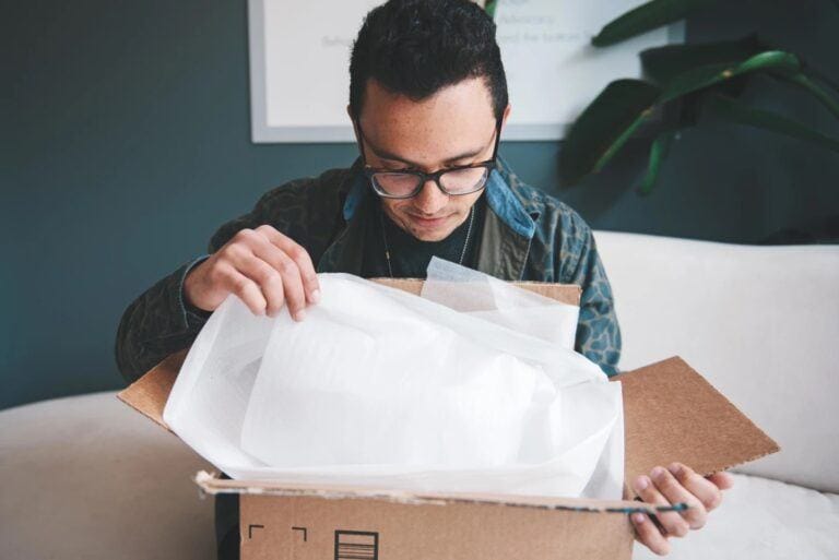 man opening a box