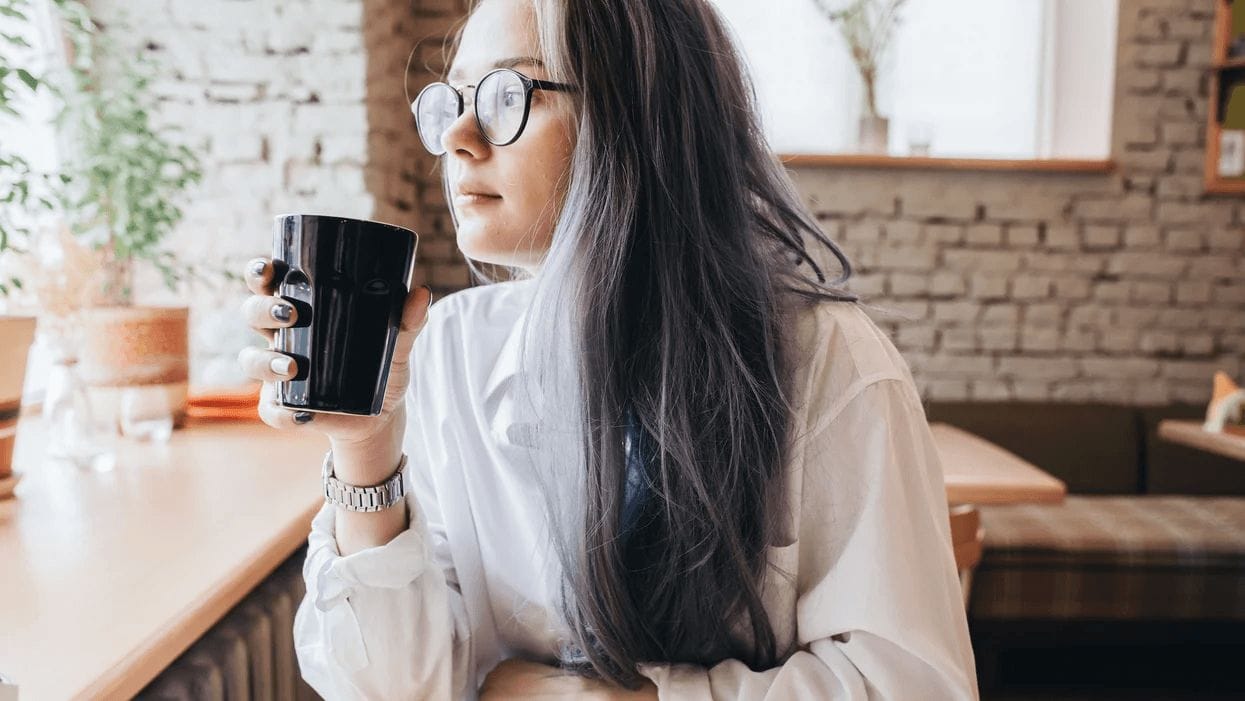 woman drinking coffee