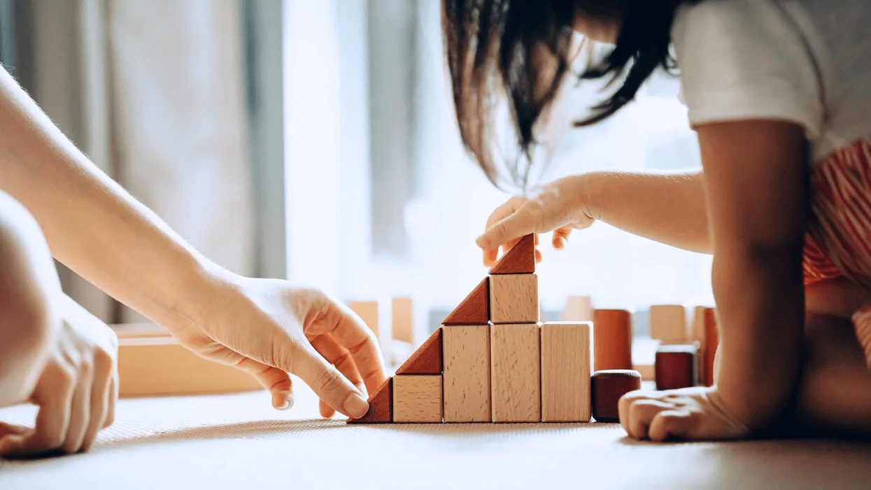 mom and child playing with montessori toys