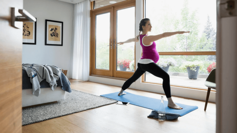 pregnant woman doing yoga