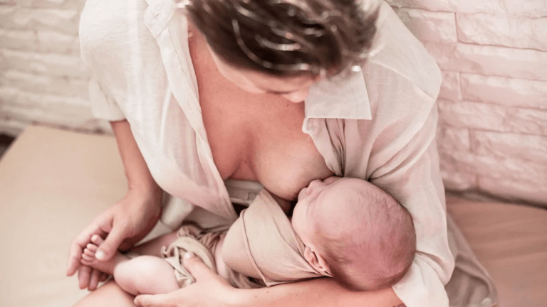 mom breastfeeding baby