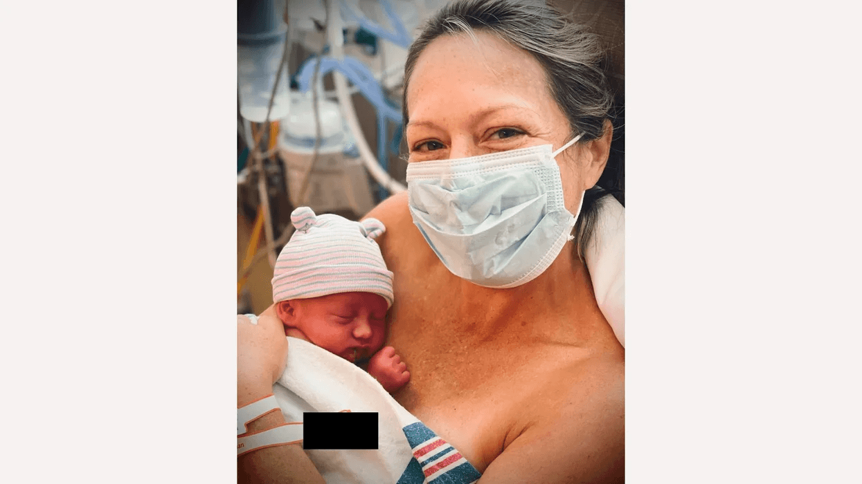 dylan-dreyer-holding-newborn