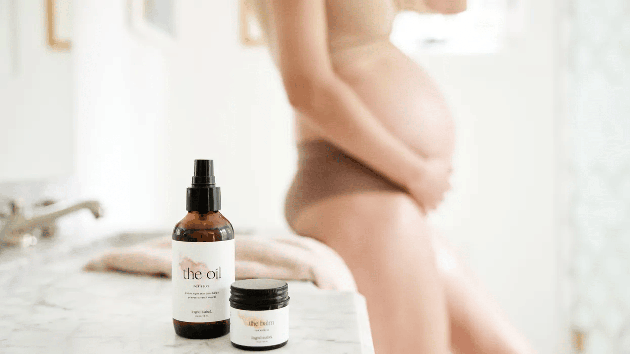 pregnant woman with Ingrid + Isabel products