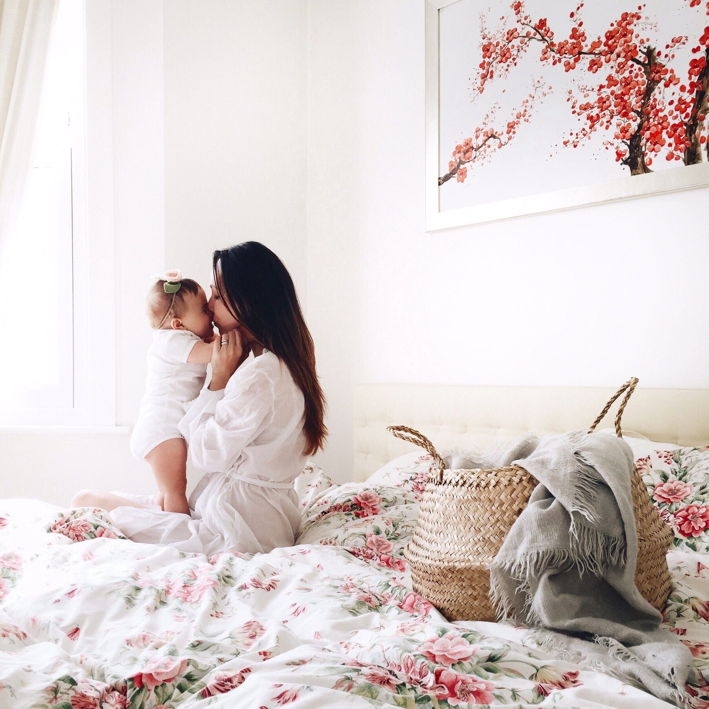 mom kissing her baby showing that a mother's love is the most powerful thing