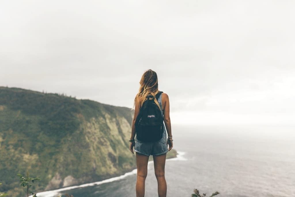 woman hiking alone - reconnect with your identity