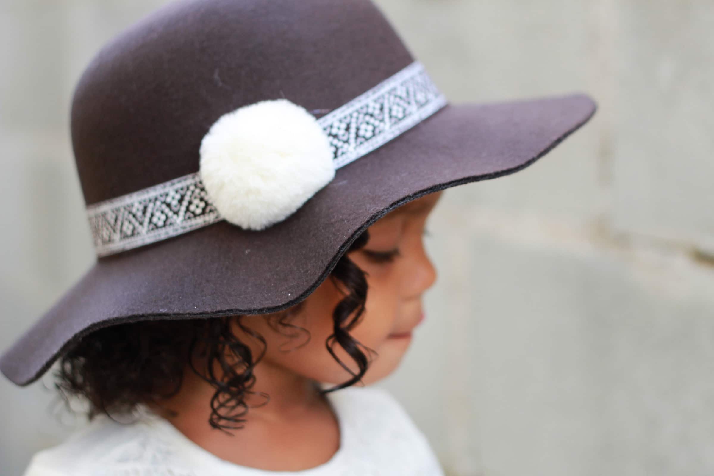 child wearing a sun hat