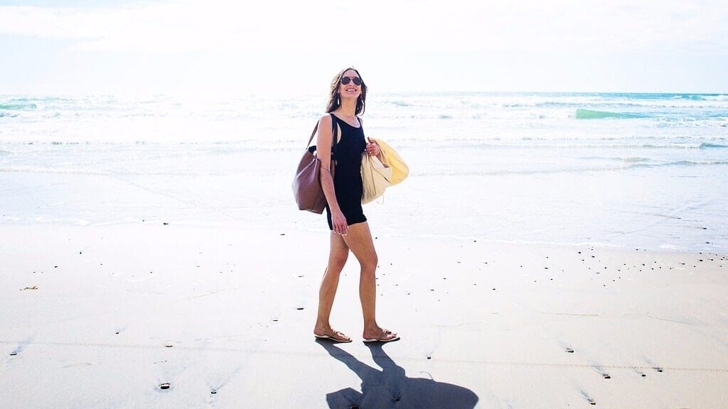 woman walking on beach