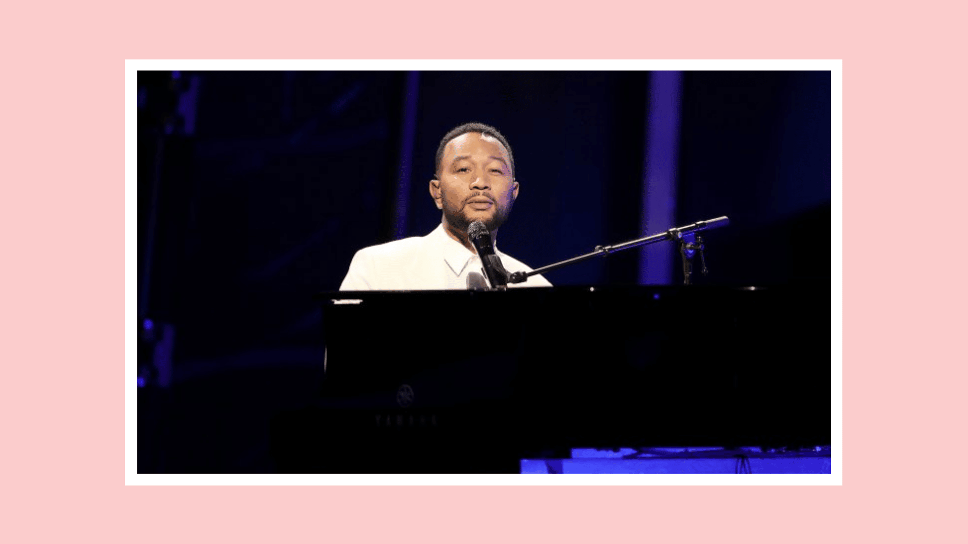 John Legend playing piano