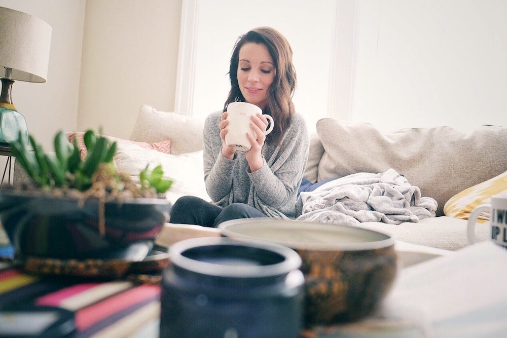 Michelle Brandriss holding a cup of coffee