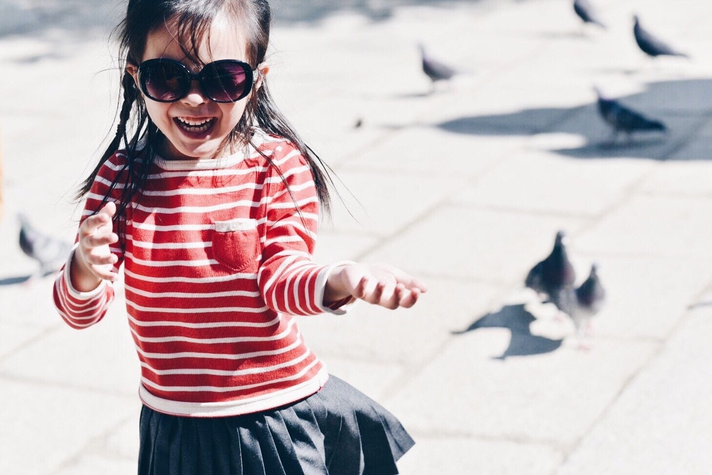 little girl playing outside