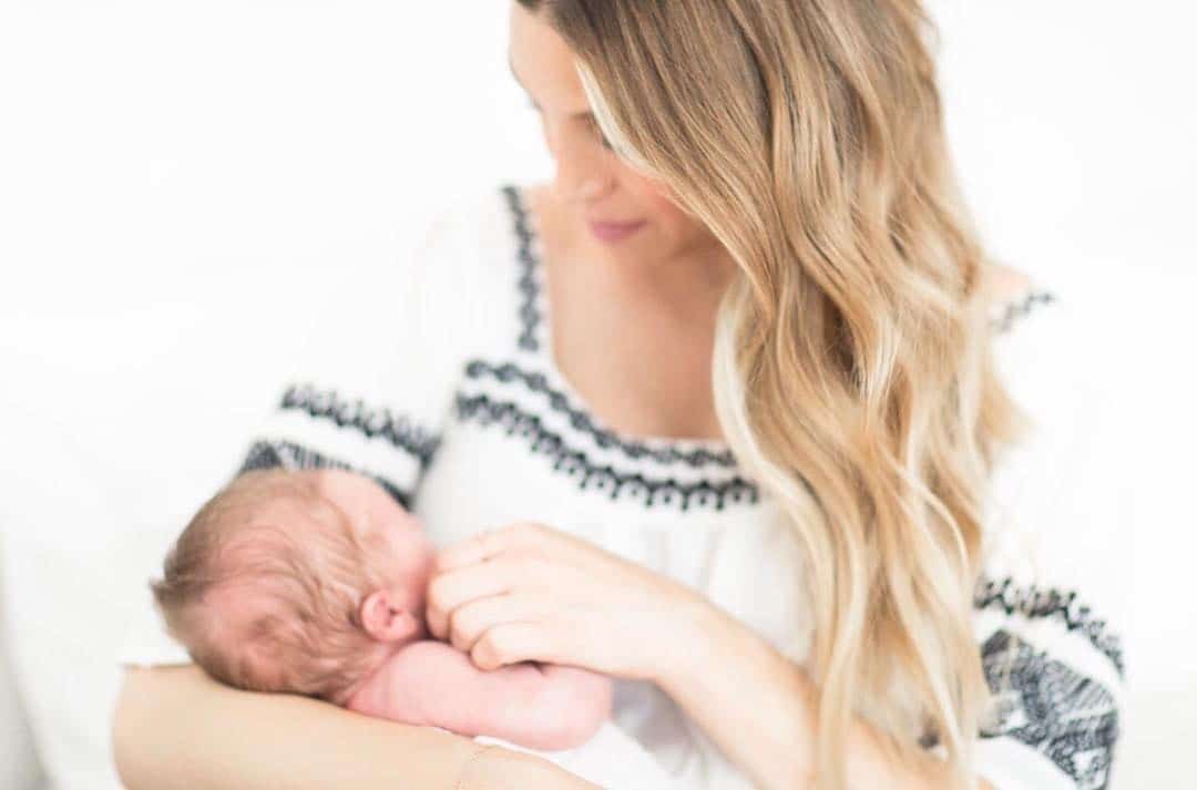 whitney port holding child