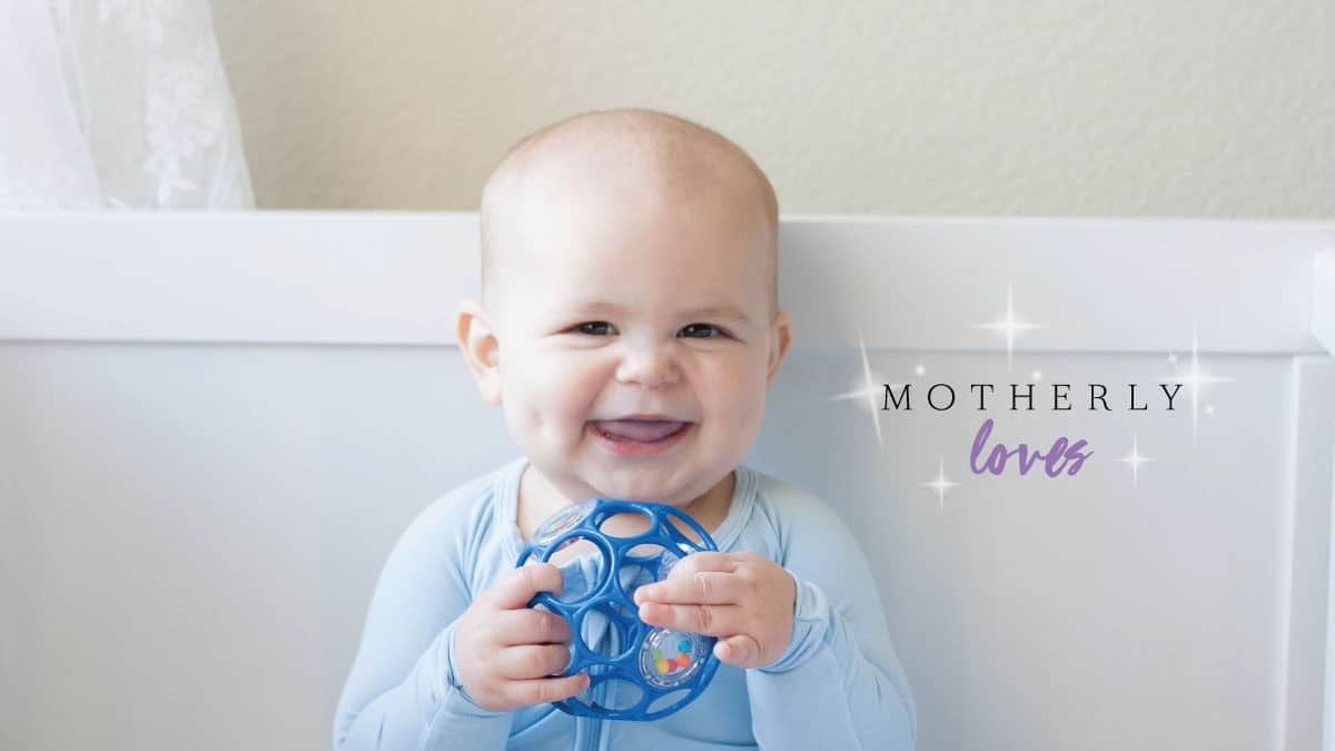 happy baby with a ball