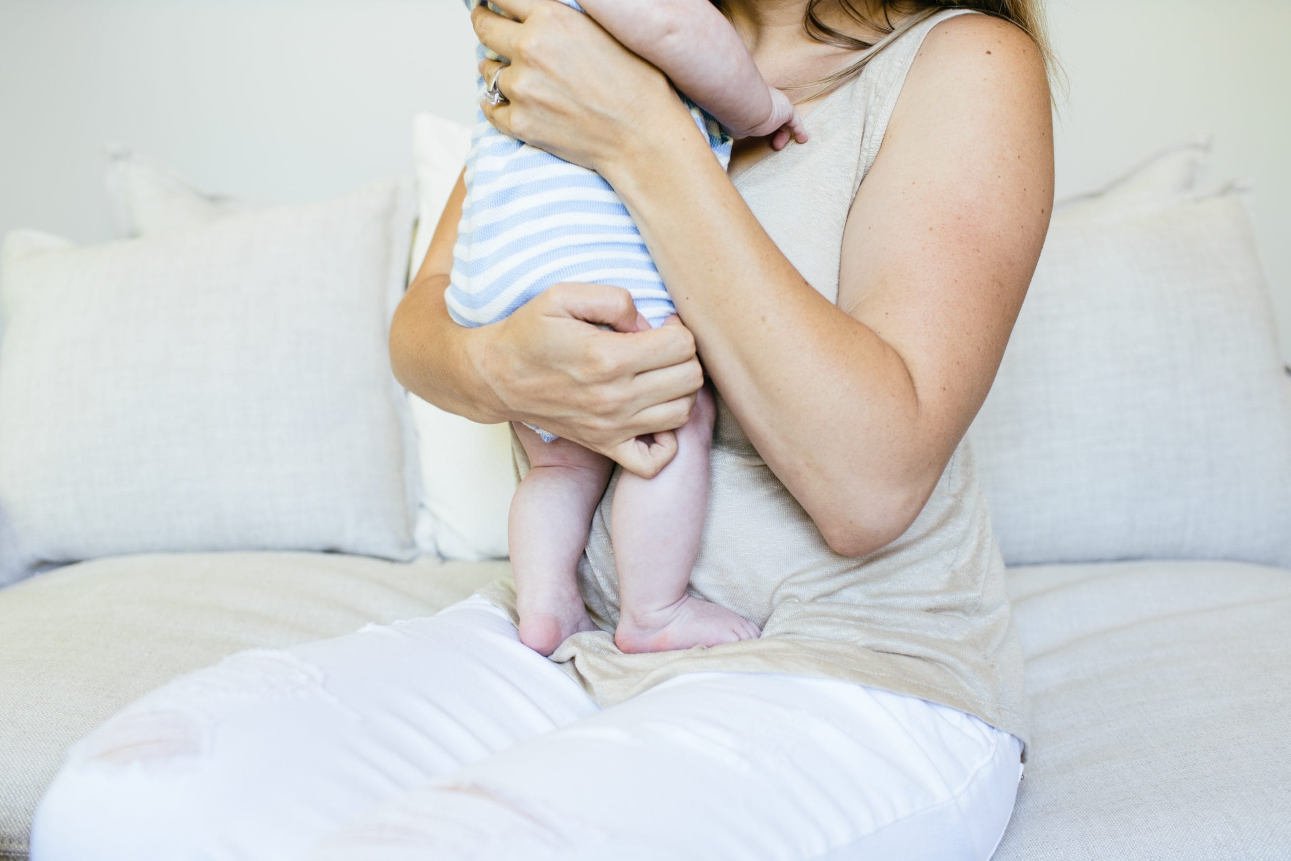 mom holding newborn baby