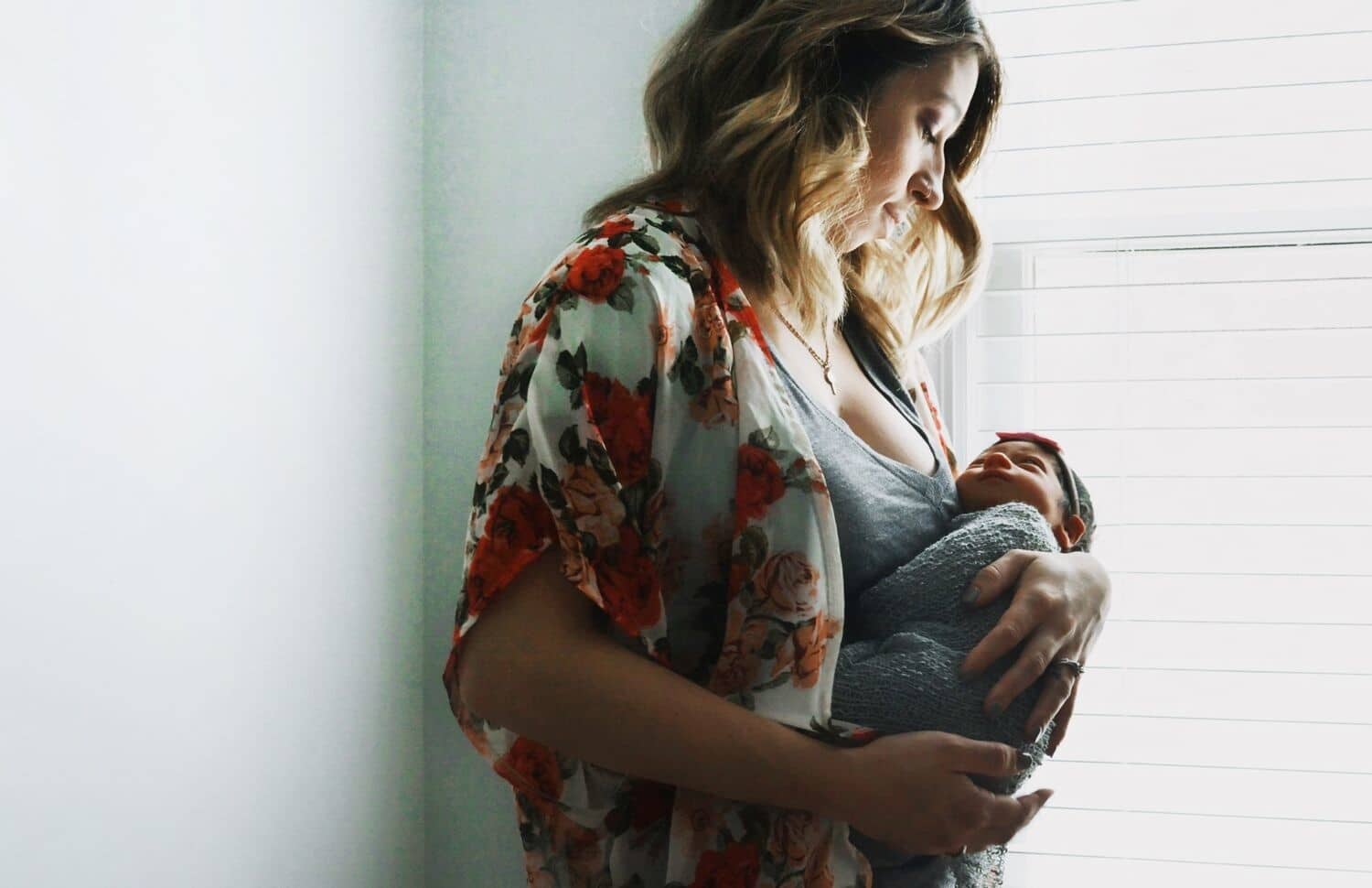 mom holding a newborn baby