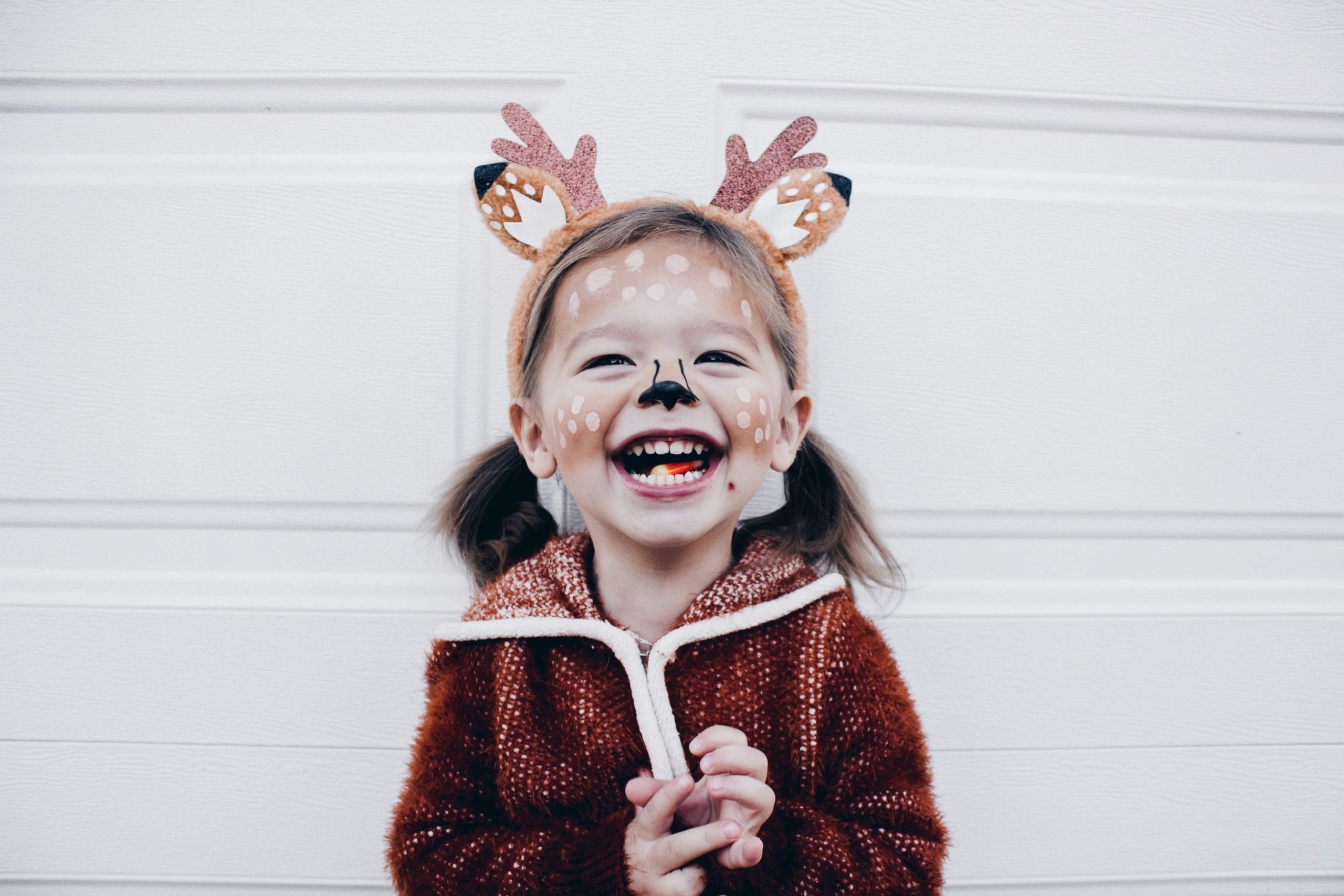 little girl in deer costume- halloween excitement