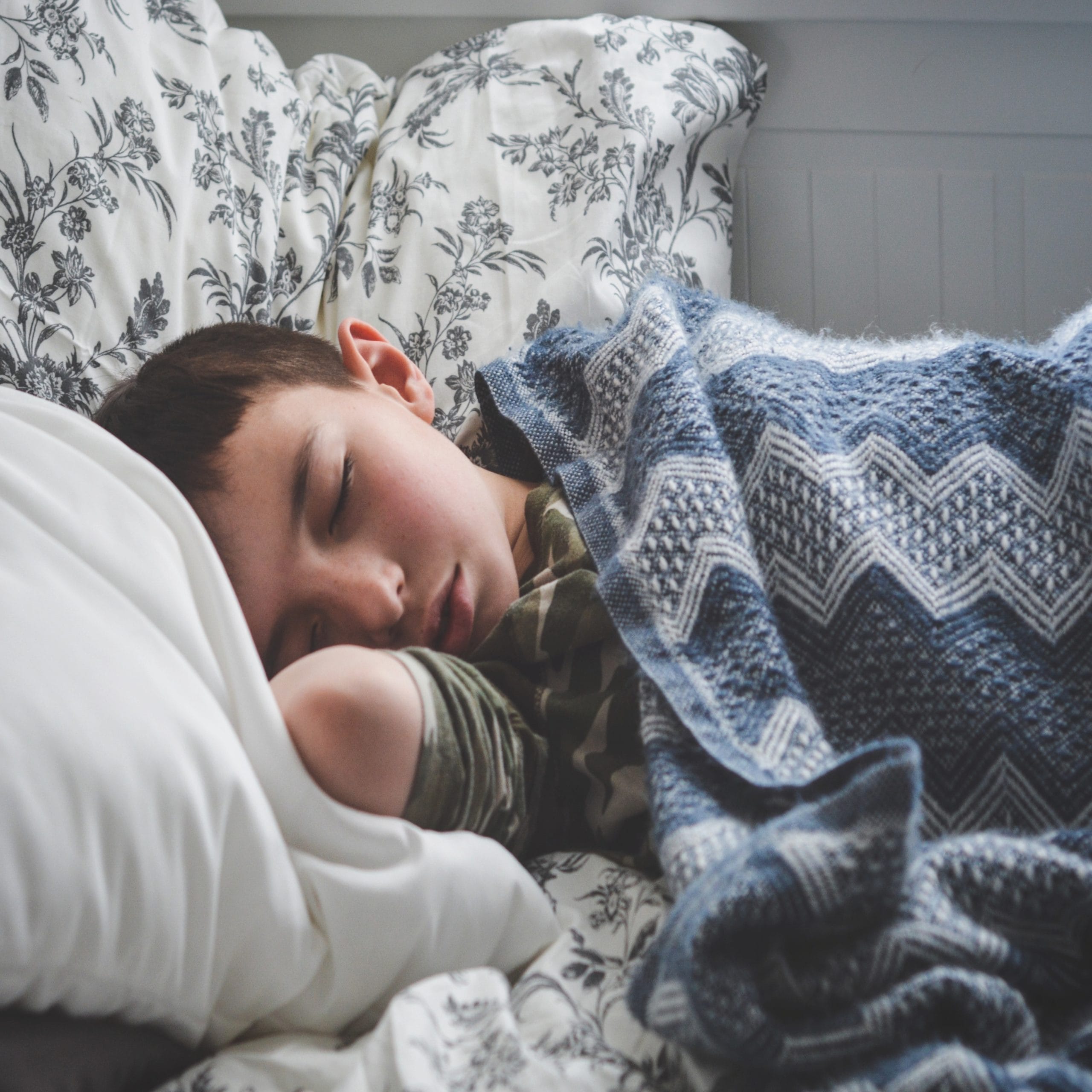 child sleeping on the couch