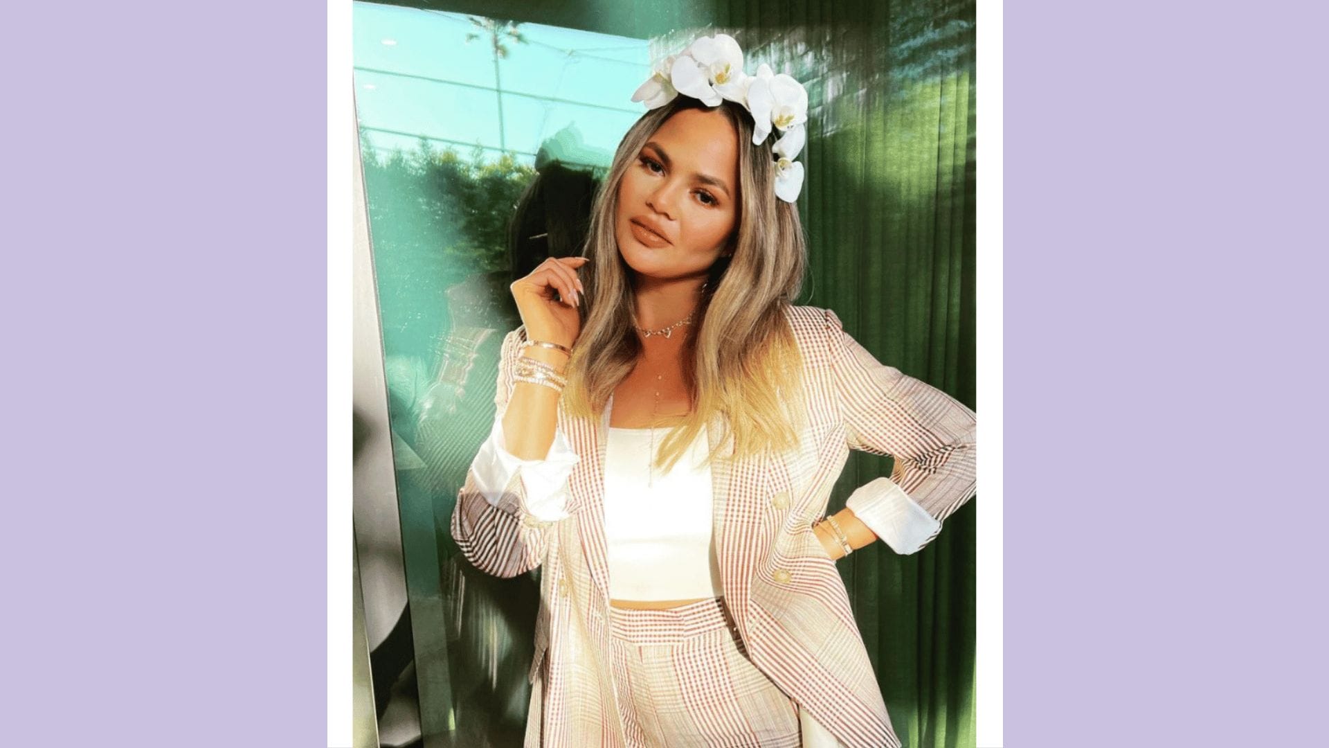 Chrissy Teigen wearing a floral headband