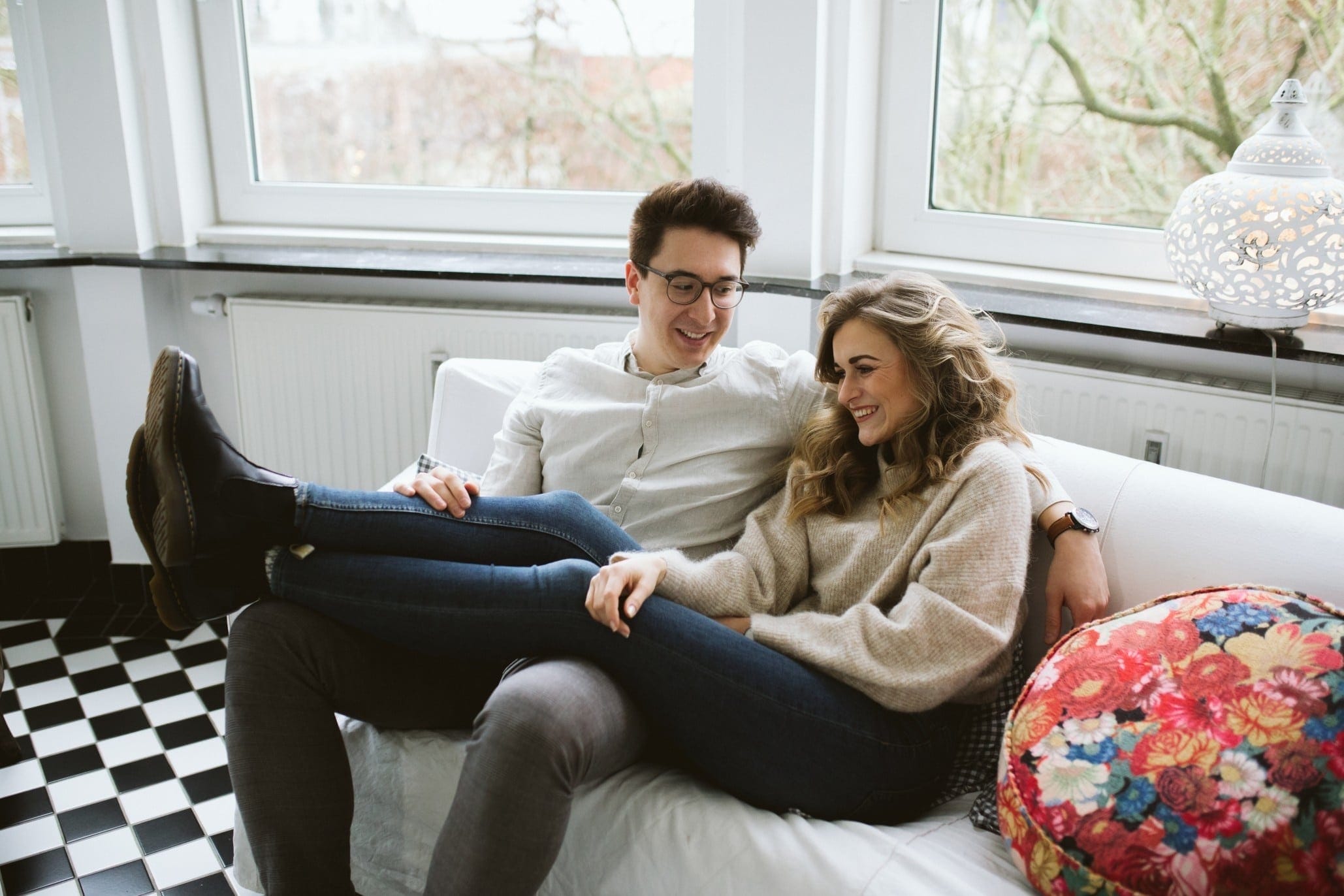 couple sitting on the couch together