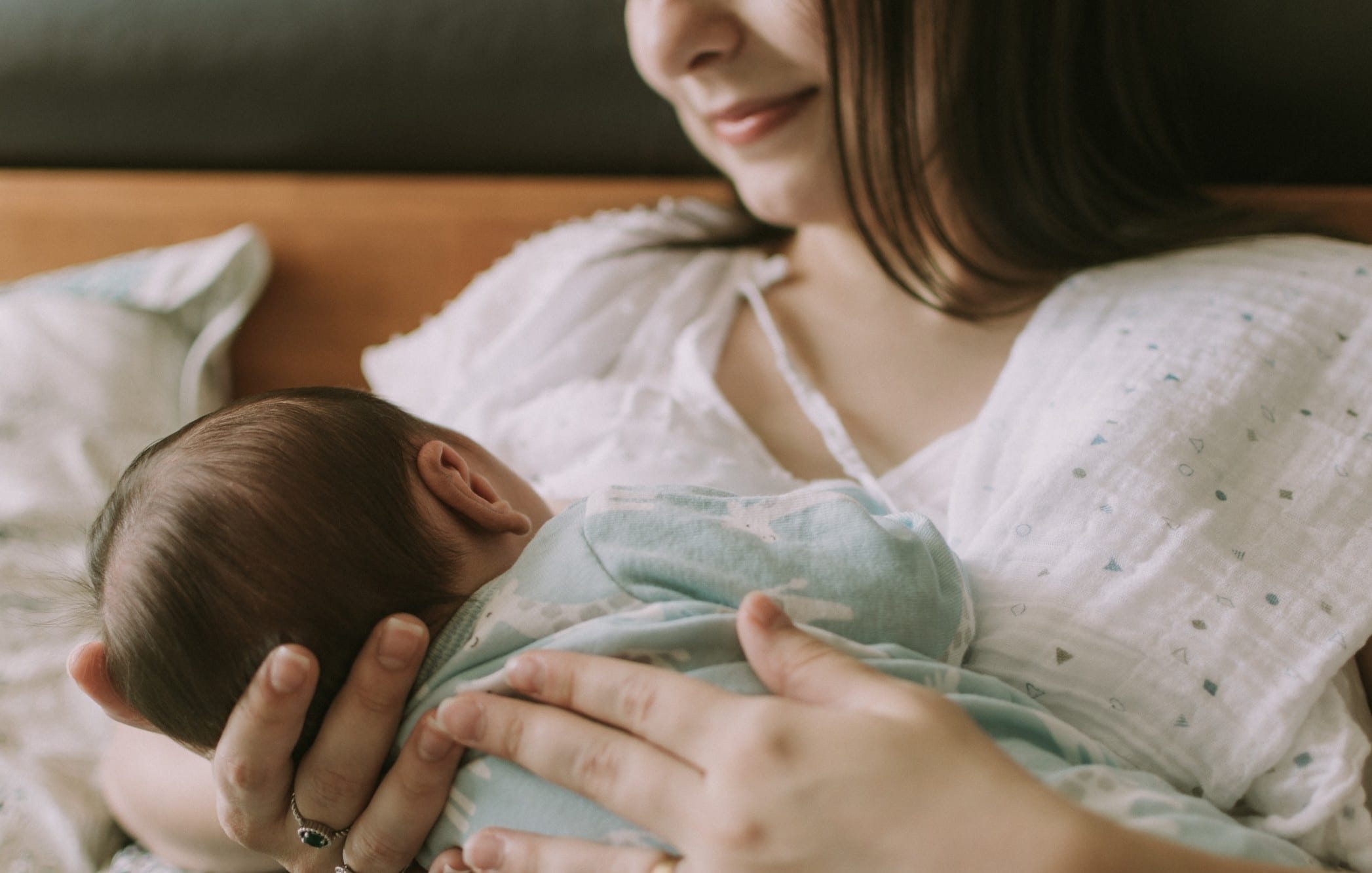 mom breastfeeding baby