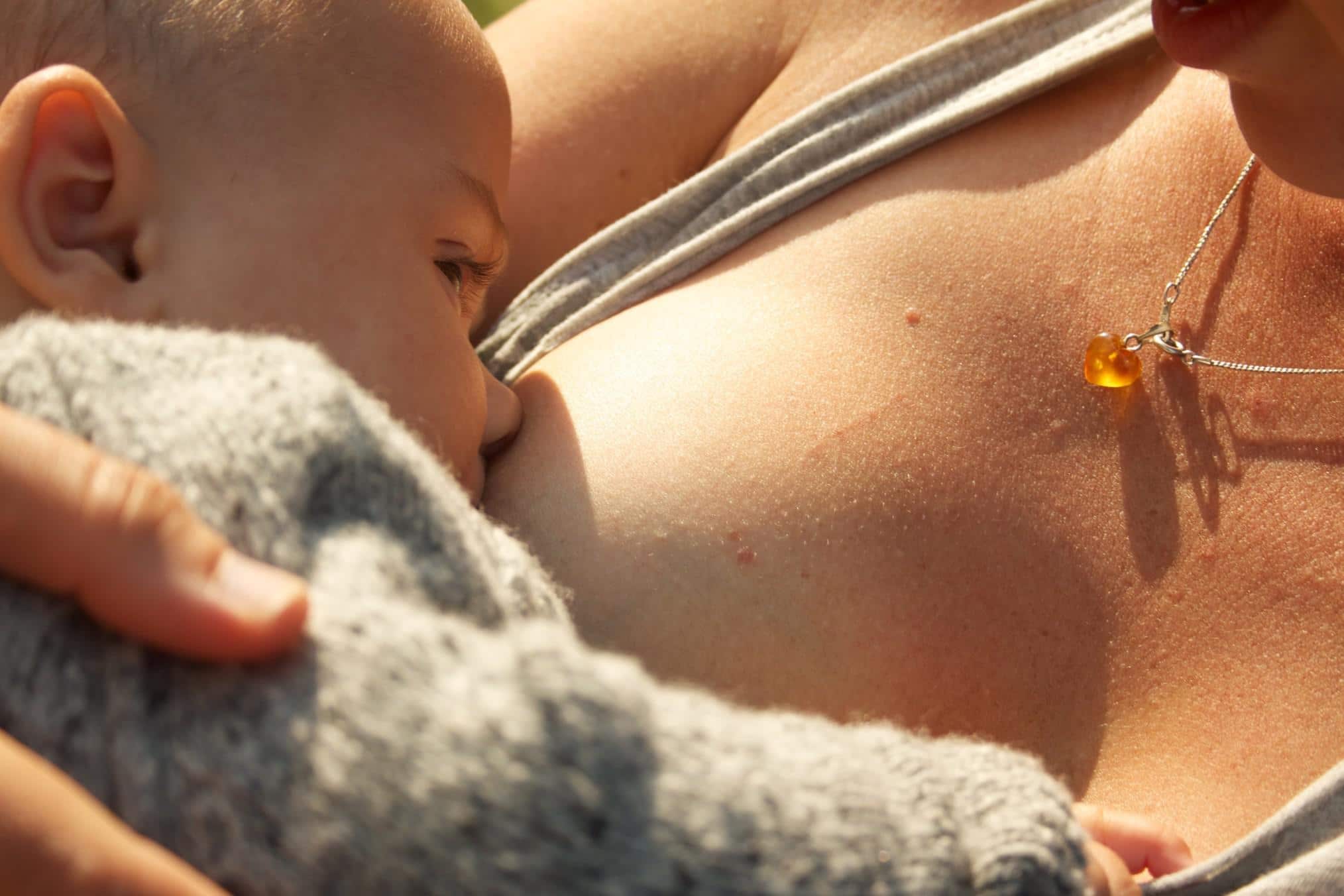 close up of baby breastfeeding