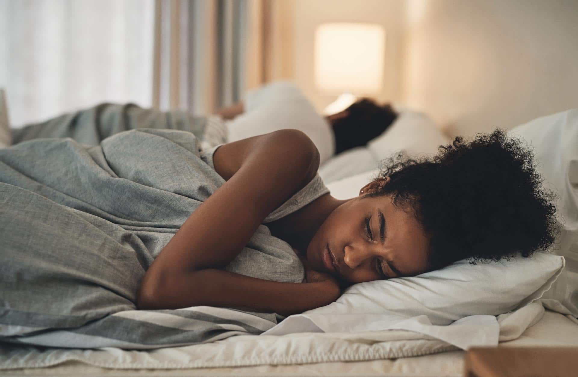 woman sleeping in a bed