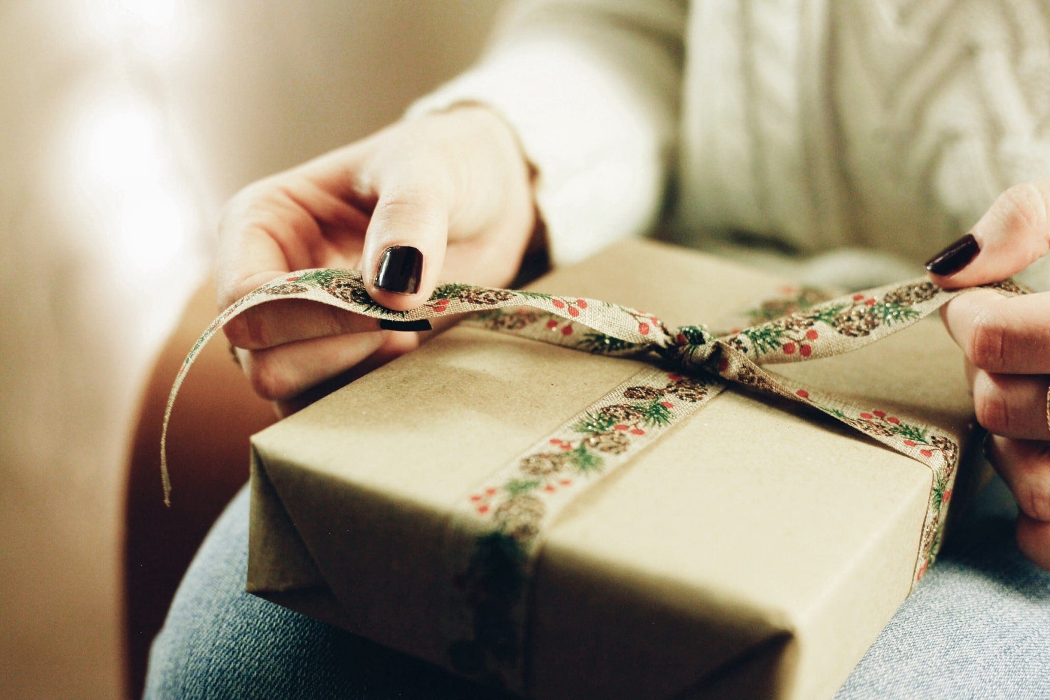 a person holding a gift box