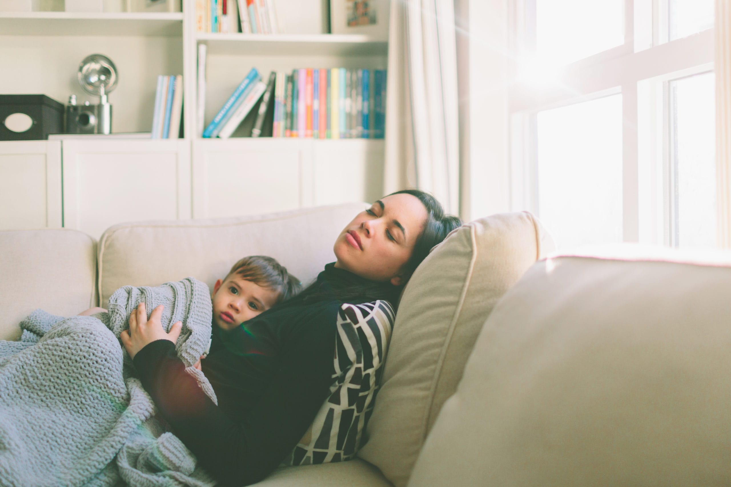 mom napping with toddler